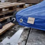 Bâches bleues 70g ou 260g/m² : éviter les déchirures près des œillets