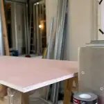 plaque anti feu brico dépôt : plâtre rose EI30 et protection inox pour poêle