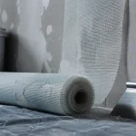 Prix m2 toile de verre : rouleau et pose sur mur en rénovation