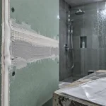 Plaque hydrofuge salle de bain sur ossature, jonction enduite hydrofuge